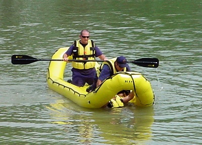 Photo of firefighters in inflatable rescue craft