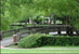 image of a walking trail with a bridge